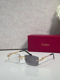 Cartier eyeglasses with gold-tone temples, clear lenses, dark top frame