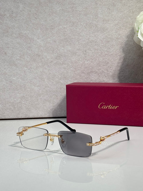 Cartier eyeglasses with gold-tone temples, clear lenses, dark top frame