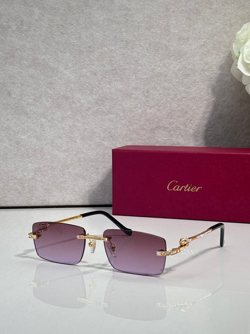 Cartier eyeglasses with purple-tinted lenses, gold frame, and blue crystal accents.