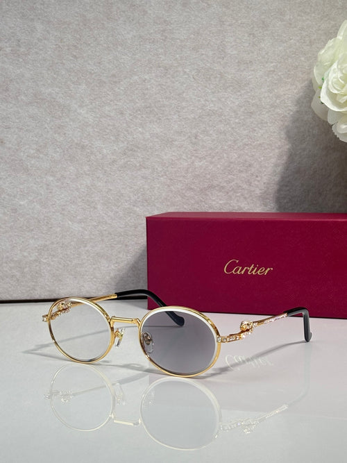 Cartier round sunglasses, gold-tone frame with gray lenses and black temples