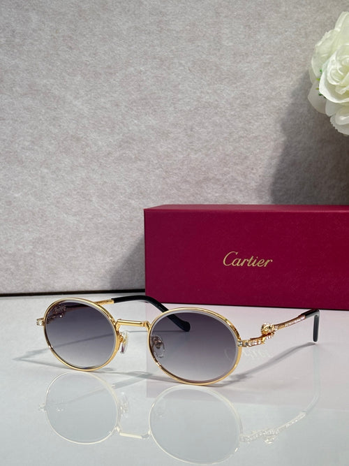 Cartier round eyeglasses with gold frame, dark blue tinted lenses, black arms