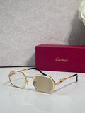 Cartier eyeglasses with gold round frames and clear-to-tan tinted lenses