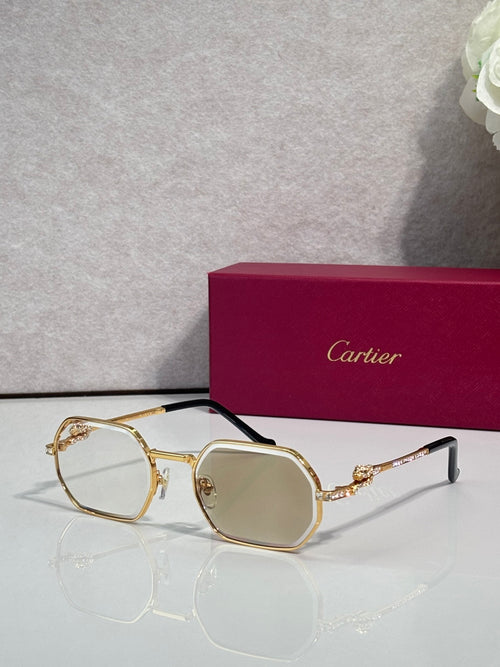 Cartier eyeglasses with gold round frames and clear-to-tan tinted lenses