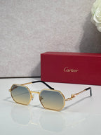Cartier eyeglasses with gold round frames and light blue lens tint, black temple arms.