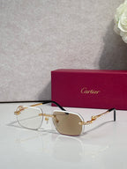 Cartier eyeglasses with gold-tone metal rectangular frames and clear lenses