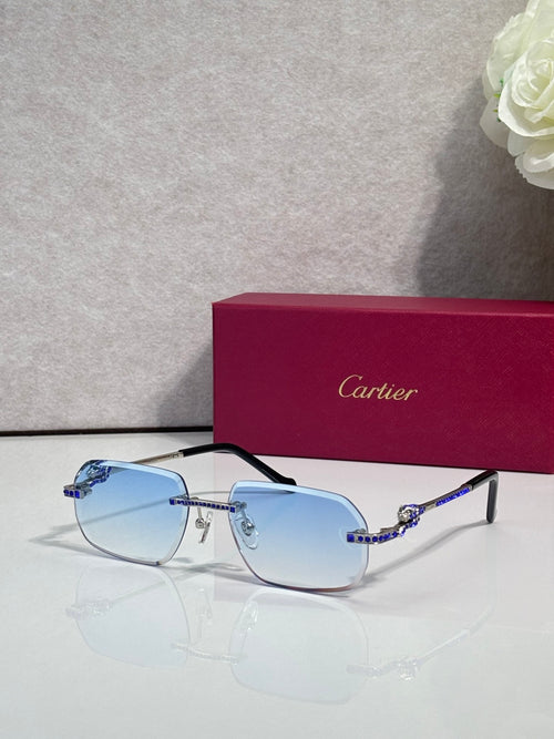 Cartier eyeglasses with gold frame and light blue lenses, blue gem accents