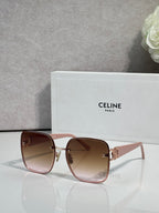 Celine sunglasses with blush pink frames, gold accents, and brown tinted lenses.