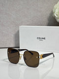 Celine sunglasses with dark frames, gold accents, and brown tinted lenses.