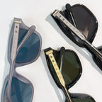 Assorted sunglasses in blue, green, and black with patterned gold-tone temple bars