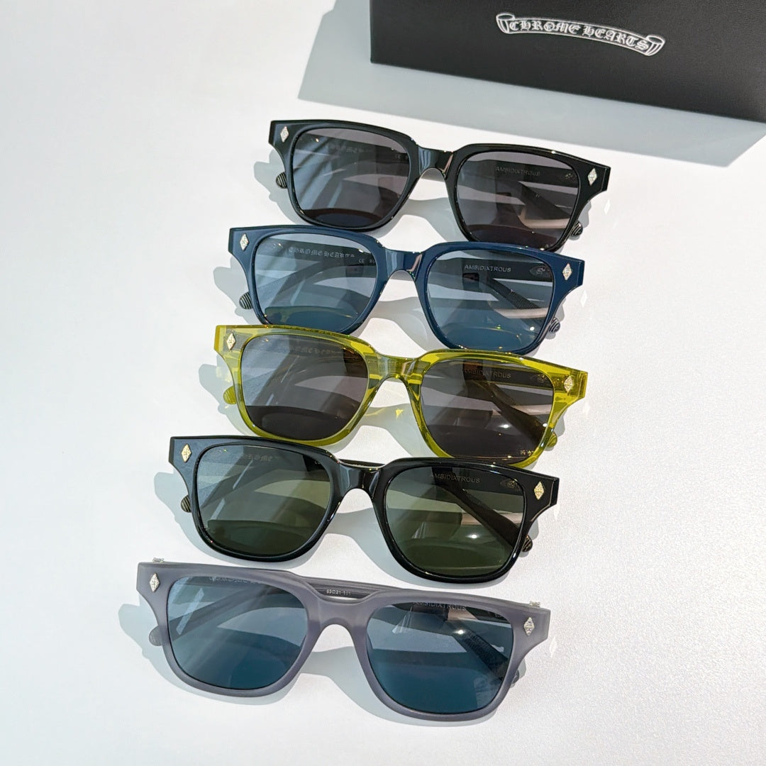Assorted sunglasses with blue, black, yellow, green, and gray frames and tinted lenses