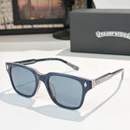 Blue and navy square sunglasses with tinted lenses and silver patterned temple tips