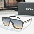 Prada black rectangular sunglasses with brown gradient lenses and gold logo temple