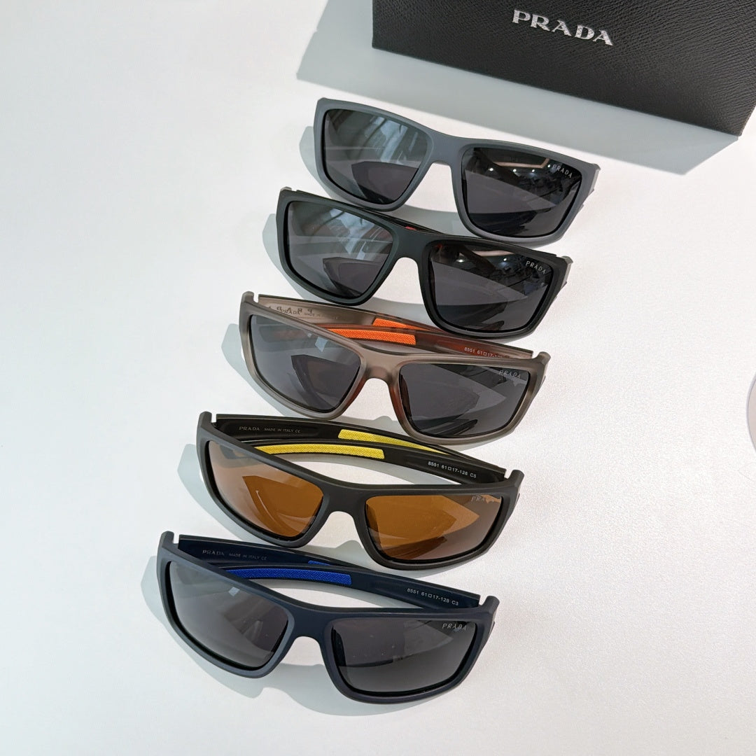 Prada sunglasses assortment with six pairs in mixed frame colors and tinted lenses