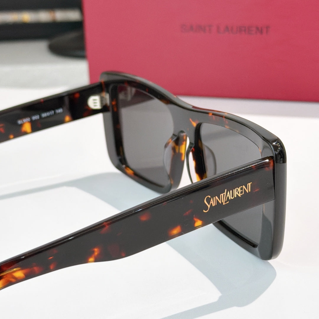 YSL Saint Laurent sunglasses, tortoiseshell arms with logo detail, side close-up