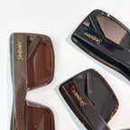 Two square sunglasses, brown and black frames with tinted lenses