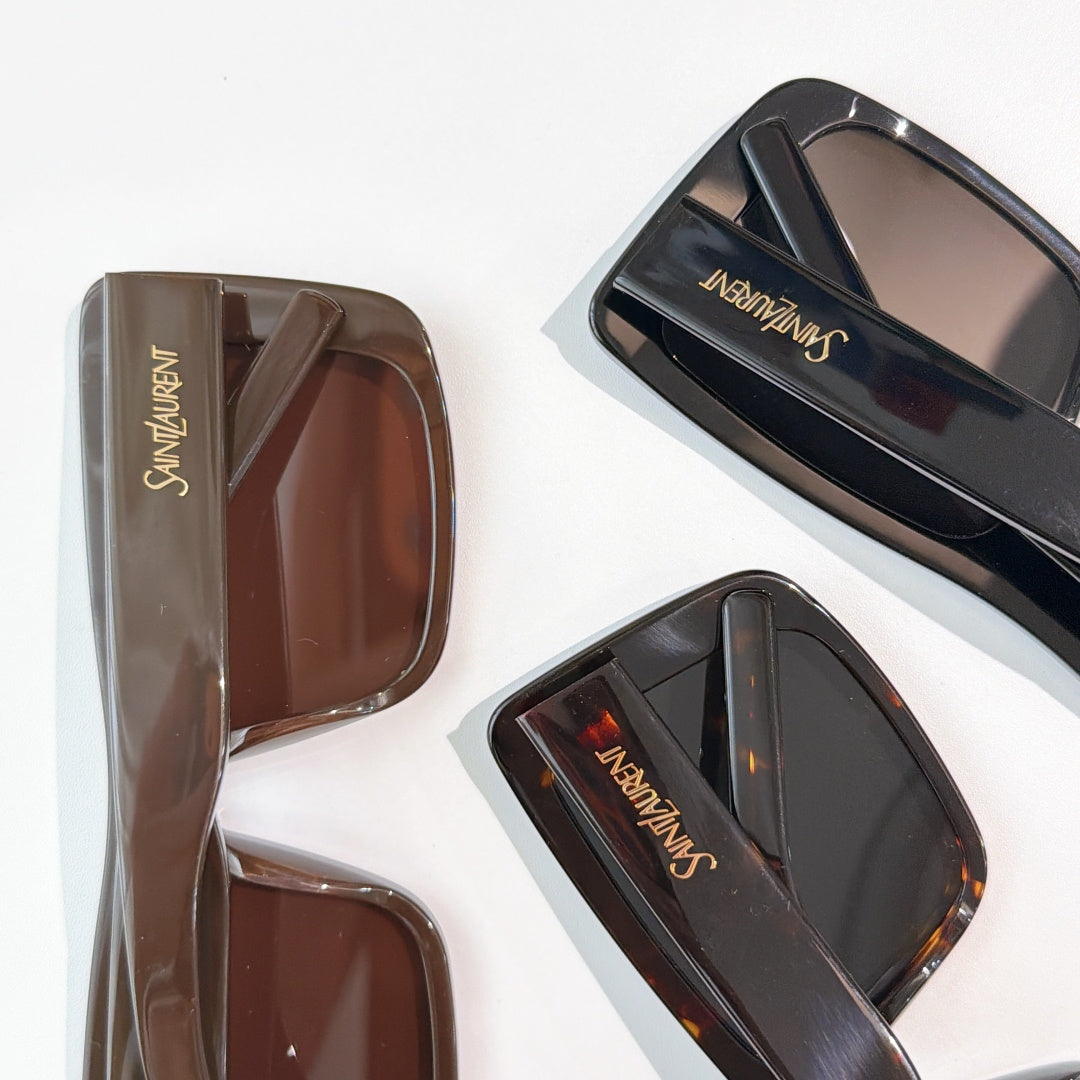 Two square sunglasses, brown and black frames with tinted lenses