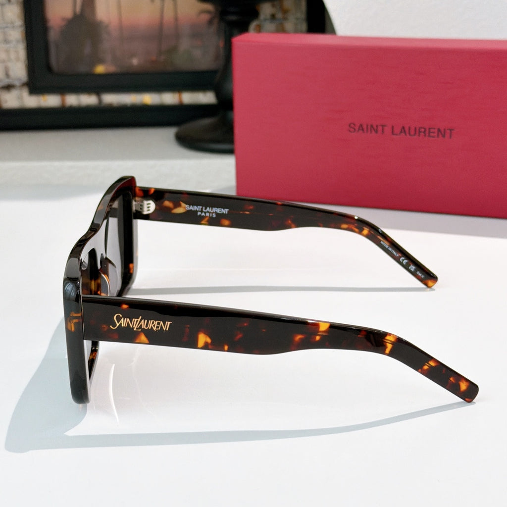 YSL Saint Laurent sunglasses, tortoiseshell frame with dark lenses, side view