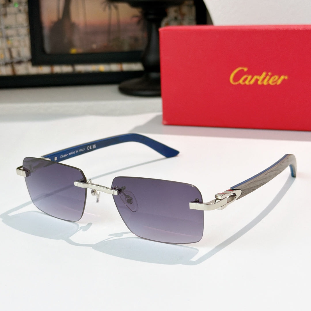 Cartier sunglasses with blue tinted frame, silver accents, and purple gradient lenses