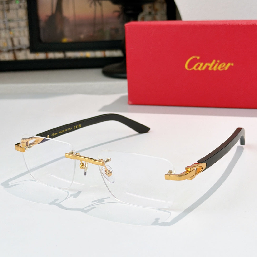 Cartier eyeglasses with clear lenses and gold frame accents, black temple arms