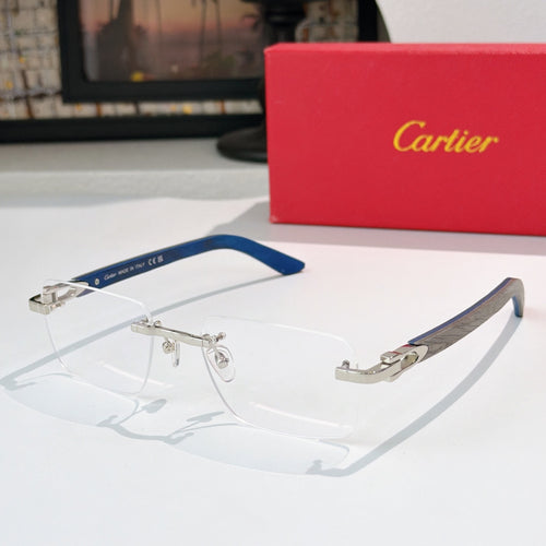 Cartier eyeglasses with clear lenses and silver frame accents, blue temple tips
