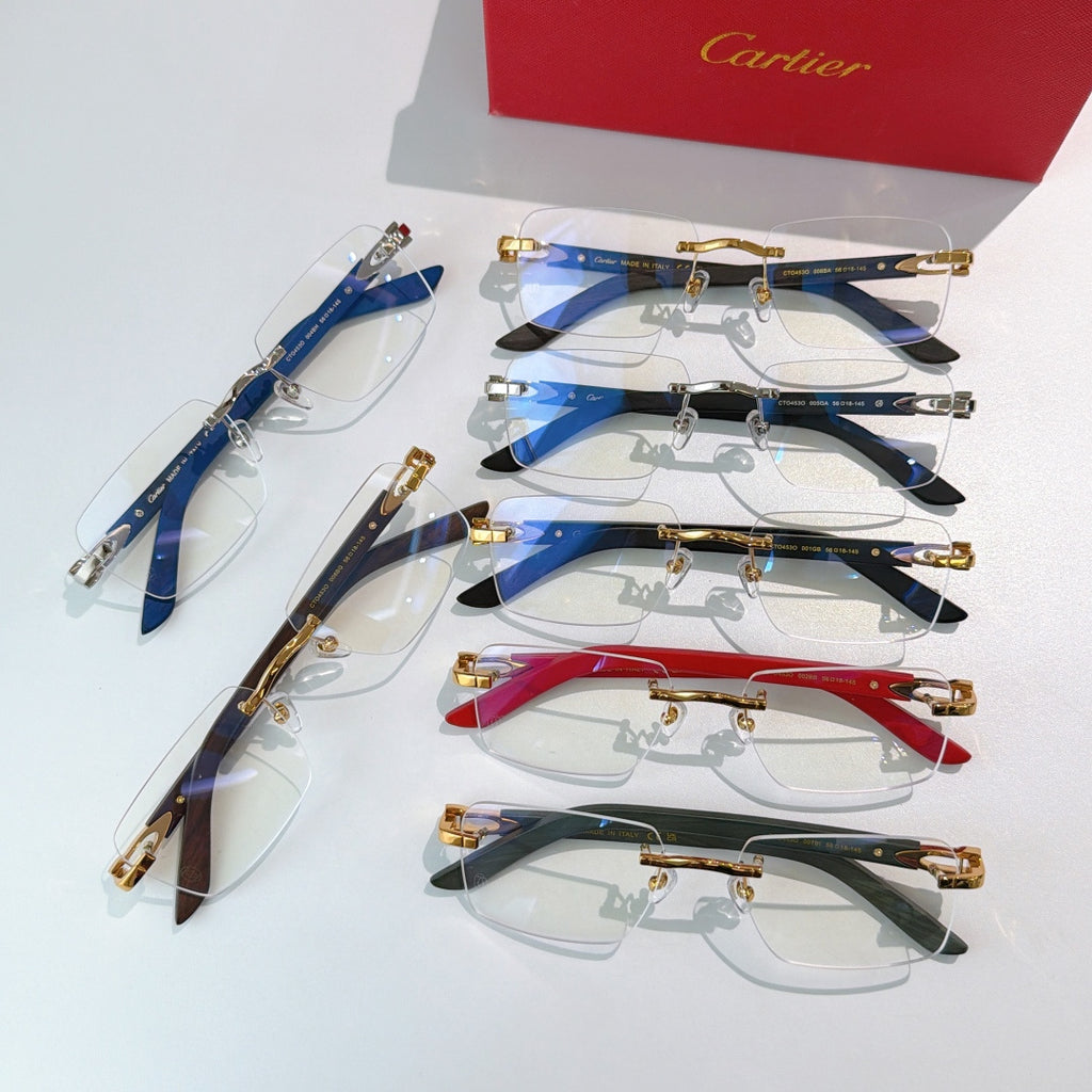 Cartier eyeglasses assortment with clear lenses and gold frames in blue, red, and dark colors