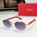 Gold-tone aviator sunglasses with purple tinted lenses and red temple accents