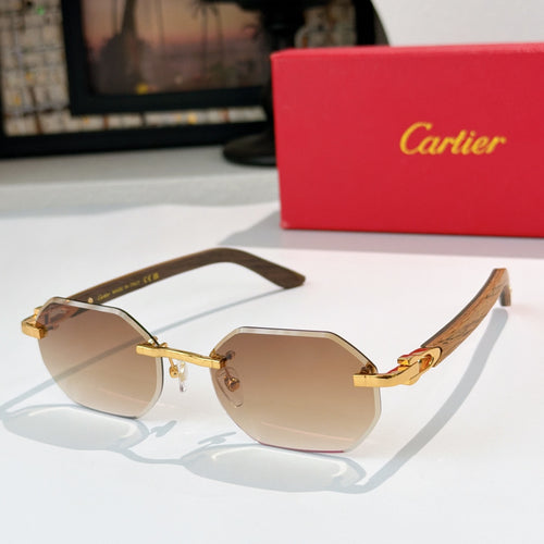 Gold-tone aviator sunglasses with tinted amber lenses and curved temple tips