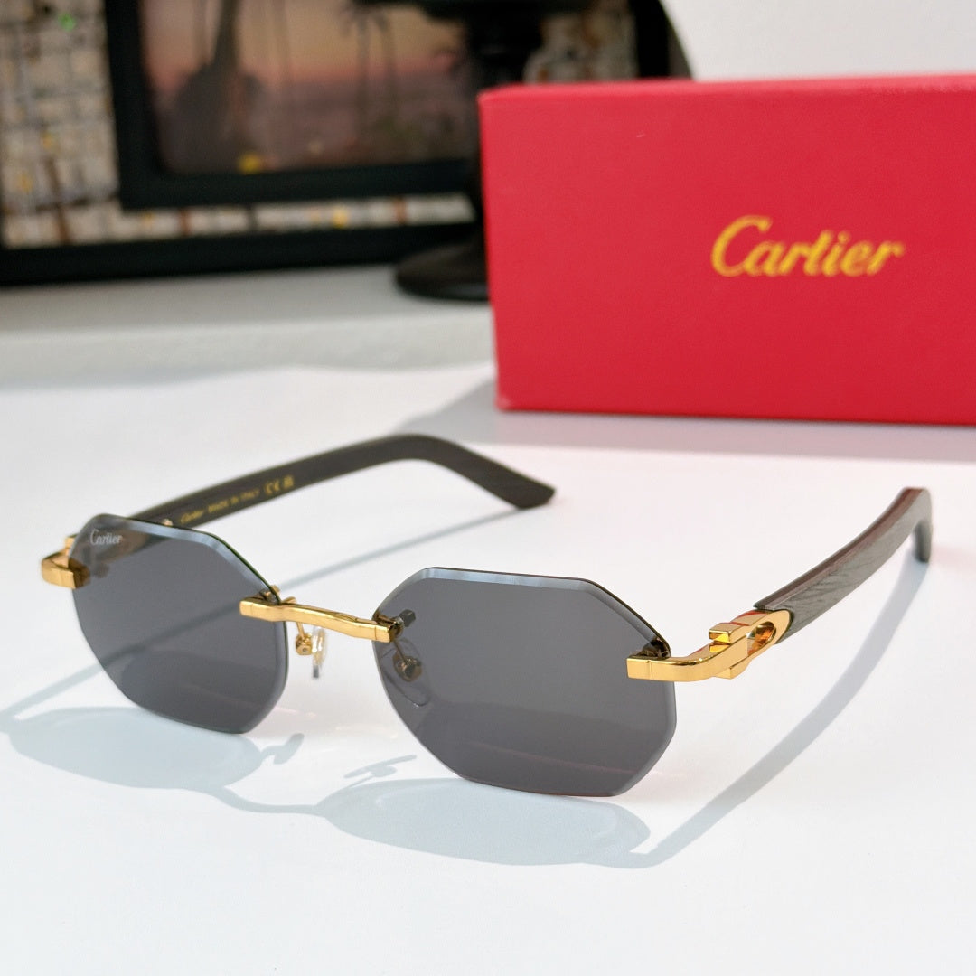 Gold-tone aviator sunglasses with dark gray tinted lenses and curved temple tips