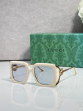 Gucci square sunglasses with cream frame and light blue lenses