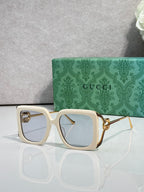 Gucci square sunglasses with cream frame and light blue lenses