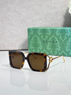 Gucci square sunglasses with dark tortoise frame and warm brown lenses
