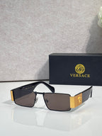 Versace sunglasses with brown lenses, gold-tone and dark blue frame, tortoiseshell sides