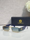 Versace rectangular sunglasses with gold-tone frame and dark blue lenses, black temple tips