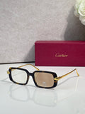 Cartier eyeglasses with black frame and gold-tone temples, clear lenses