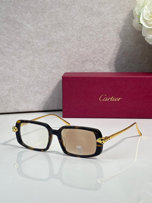 Cartier eyeglasses with black frame and gold-tone temples, clear lenses