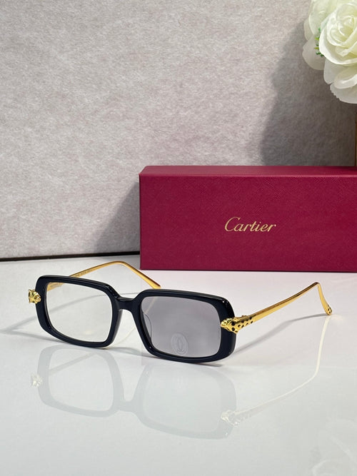 Cartier eyeglasses with black frame and gold-tone temples, gray tinted lenses