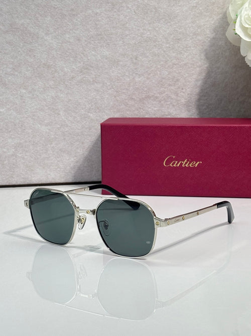 Green-tinted round sunglasses with gold-tone metal frame and dark lenses