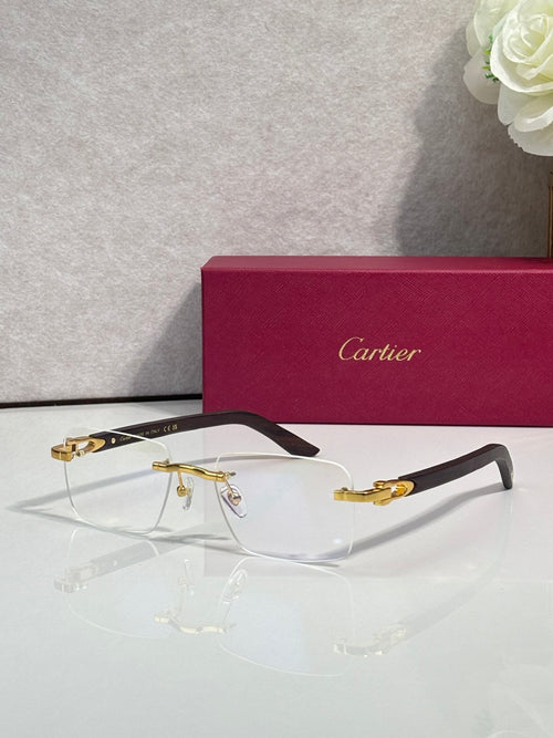 Eyeglasses with clear lenses, gold metal frame, dark green arms and temples