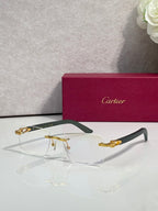 Eyeglasses with clear lenses, gold metal frame, dark green arms and temples