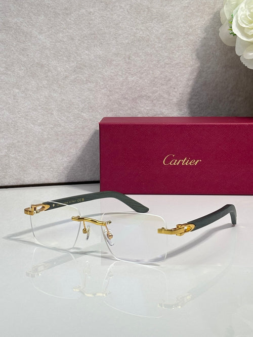 Eyeglasses with clear lenses, gold metal frame, dark green arms and temples