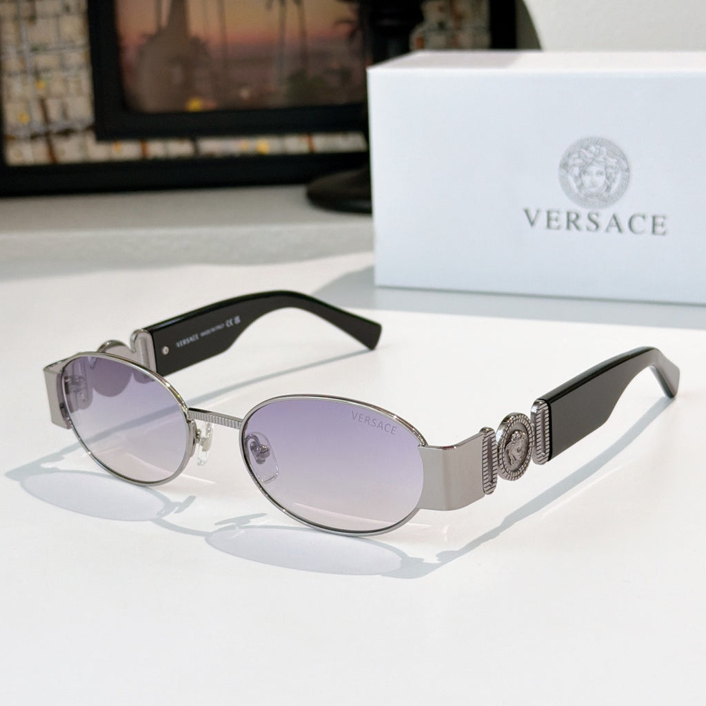 Versace sunglasses: silver frame, light purple-tinted oval lenses, black temples.