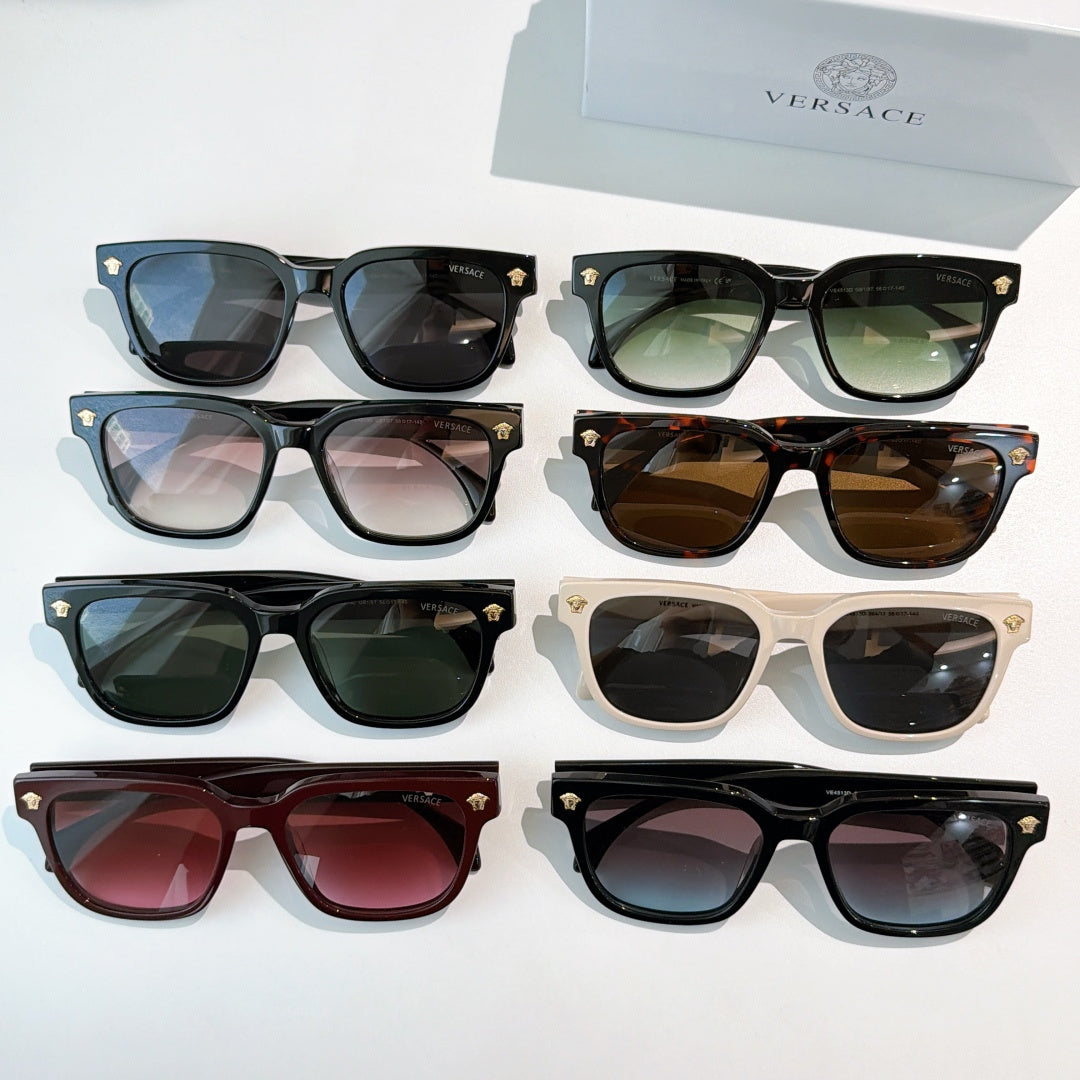 Versace sunglasses set with mixed frame colors and tinted lenses, including black and cream