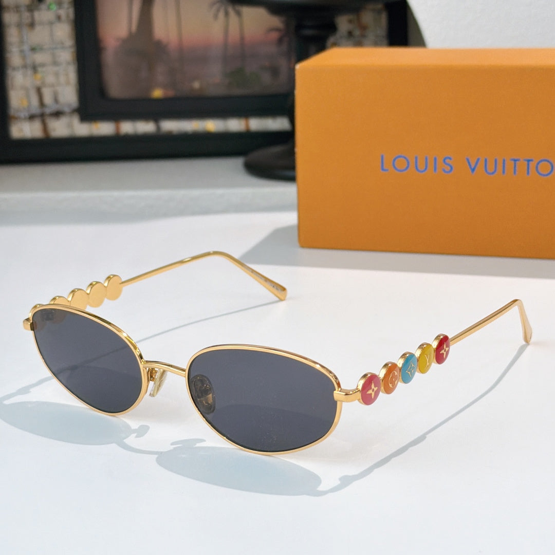 Louis Vuitton sunglasses with gold frame and dark lenses, colorful bead detail on arm