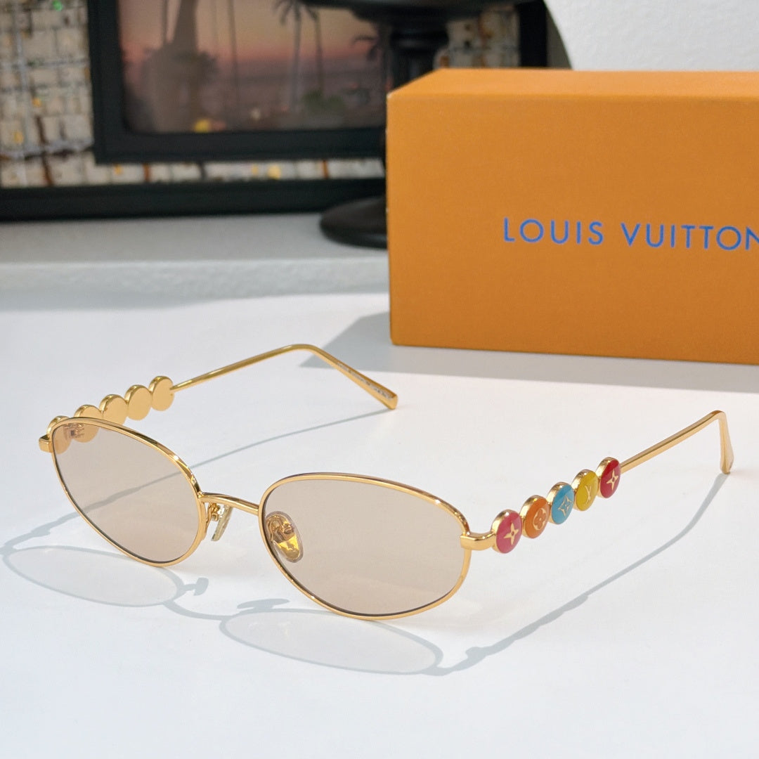 Louis Vuitton sunglasses with gold frame and clear lenses, colorful bead detail on arm