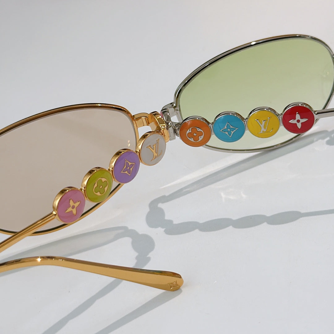 Louis Vuitton sunglasses with mixed metal frame and colorful logo charms on temple