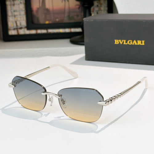 Fashion sunglasses with silver-tone frame and gradient lenses, gold-tone temple accents