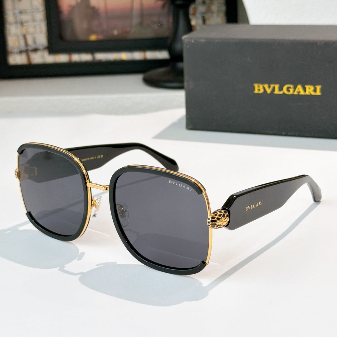 Bvlgari sunglasses with black frames, gold accents, and dark tinted lenses