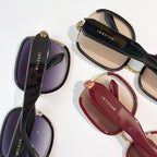 Bvlgari sunglasses set with dark, red, and black frames and tinted lenses