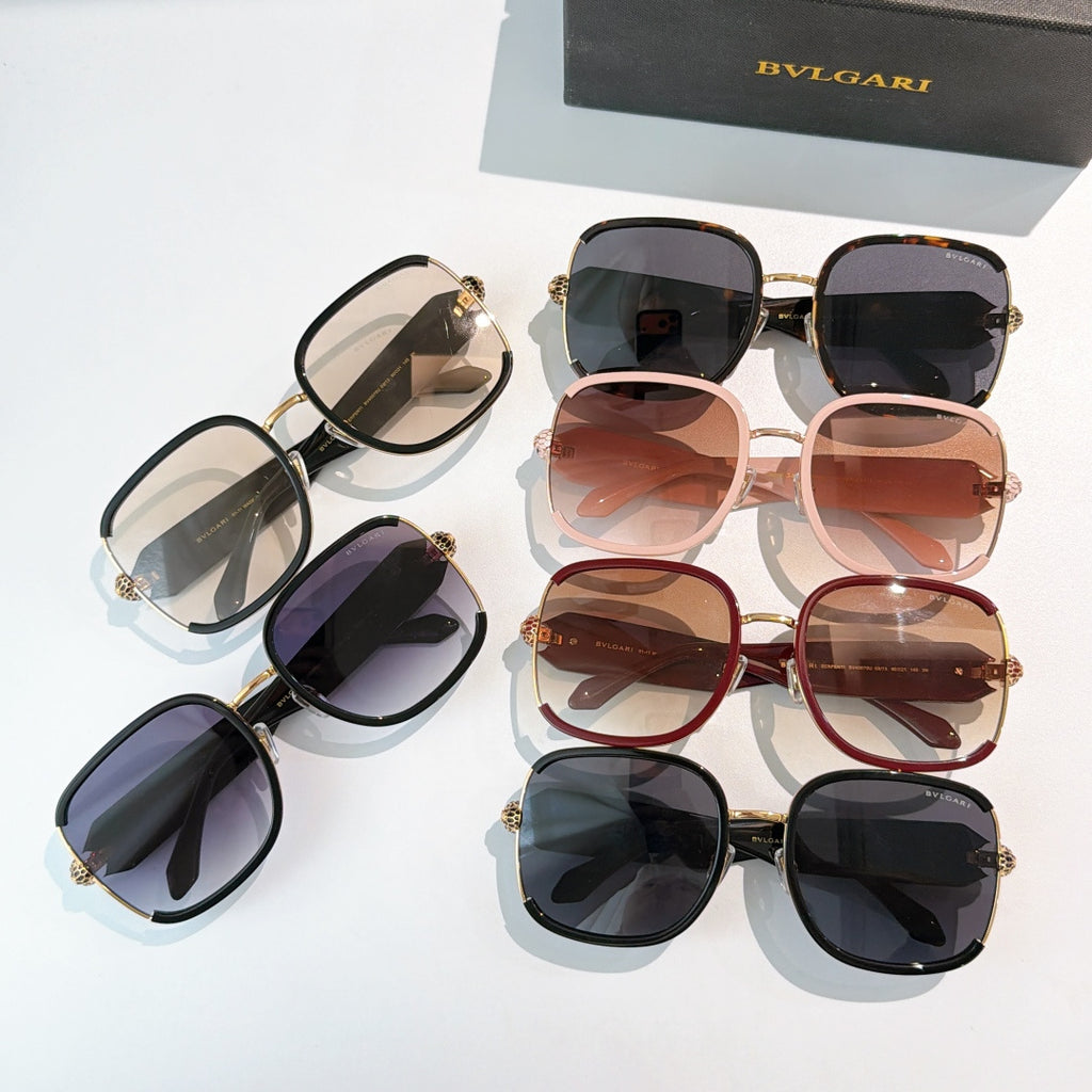 Assorted Bvlgari sunglasses with black, red, and pink frames and tinted lenses