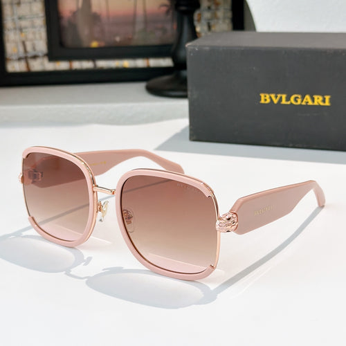 Bvlgari sunglasses with pink frames, gold accents, and light tinted lenses